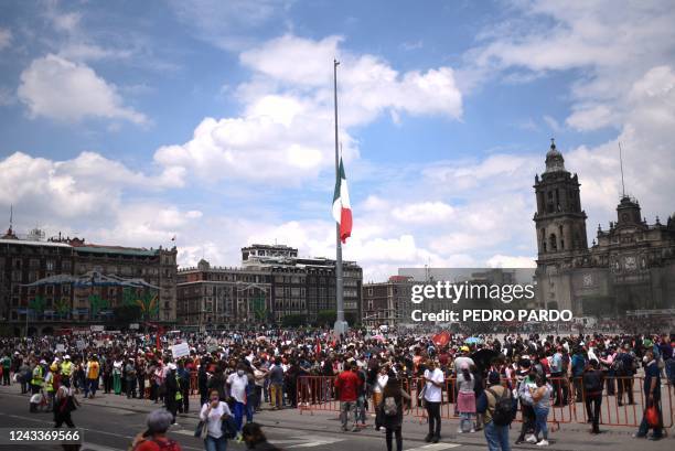 People remain at Zocalo square after an earthquake in Mexico City on September 19, 2022. 8-magnitude earthquake struck western Mexico on Monday,...