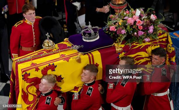 The bearer party with the coffin of Queen Elizabeth II during the state funeral held at Westminster Abbey on September 19, 2022 in London, England....