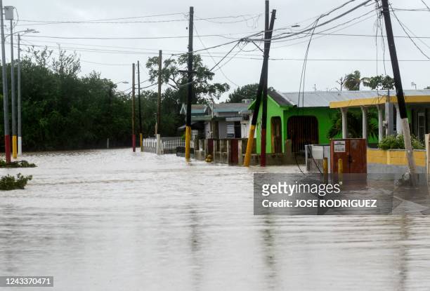 Flooded street is seen after the passage of hurricane Fiona in Salinas, Puerto Rico, on September 19, 2022. - Hurricane Fiona smashed into Puerto...