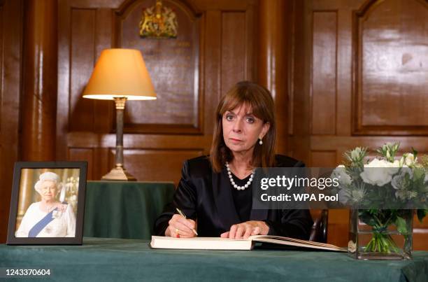 President of Greece, Katerina Sakellaropoulou, signs a book of condolence at Church House following the State Funeral of Queen Elizabeth II on...