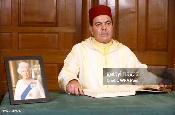Prince Moulay Rachid of Morocco, signs a book of condolence at Church House following the State Funeral of Queen Elizabeth II on September 19, 2022...