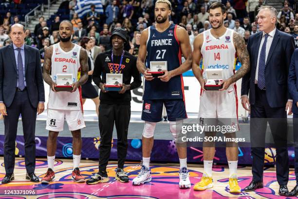 Lorenzo Brown of Spain Dennis Schroder of Germany , Rudy Gobert , and Willy Hernangomez of Spain receive awards for Eurobasket All-Star Five after...