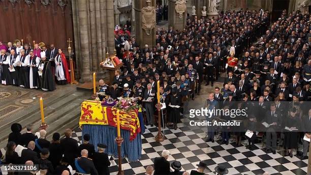 Queen Elizabeth II is laid to rest at in Windsor Castle after a historic state funeral service in Westminster Abbey, London, United Kingdom on...