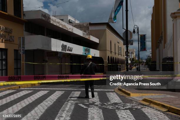 General view of damaged buildings after a 7.7 magnitude quake struck the west coast in Michoacan State after a drill to commemorate two prior...