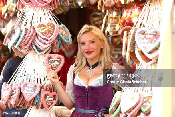 Evelyn Burdecki with heart during the Cathy Hummels Wiesnbummel Wir lieben das Leben as part of the Oktoberfest 2022 on September 19, 2022 in Munich,...