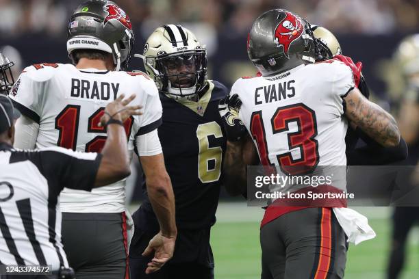 Tampa Bay Buccaneers quarterback Tom Brady and wide receiver Mike Evans react to the New Orleans Saints defensive backs Marcus Maye and Marshon...