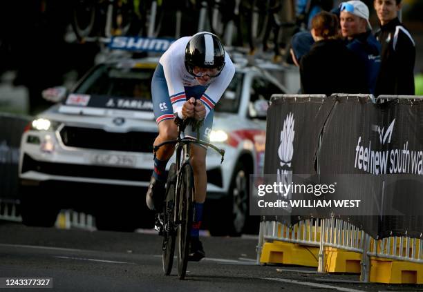 Britain's Joshua Tarling heads to the gold medal in the men junior individual time trial cycling event at the UCI 2022 Road World Championship in...