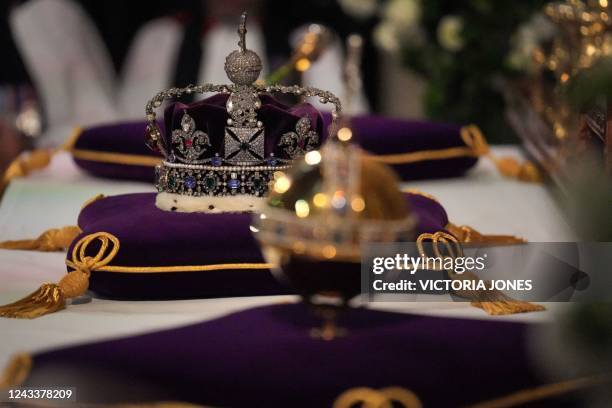 The Imperial State Crown, and orb and sceptre are pictured on the high altar during the Committal Service for Britain's Queen Elizabeth II in St...