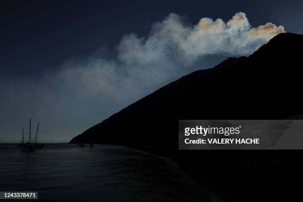 Smoke rises from the Stromboli volcano on September 13, 2022. - Stromboli, one of Europe's most active volcanoes, is part of the seven-island Eolian...