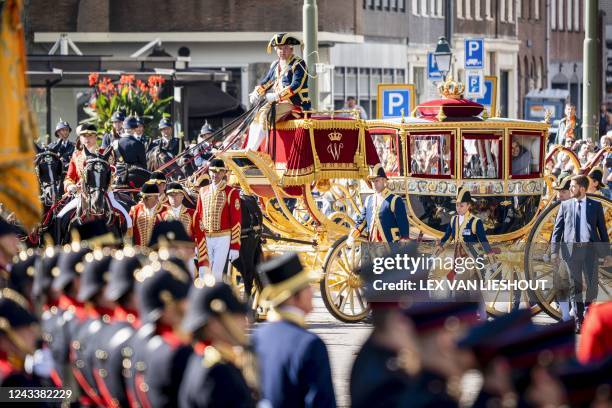 The Glass Carriage carrying the royal family arrives at the Royal Theater, known as Koninklijke Schouwburg, during the Prince's Day in The Hague on...