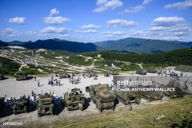 South Korean Army vehicles are seen after a live fire military exercise during the Defense Expo Korea at a training field near the demilitarized zone...