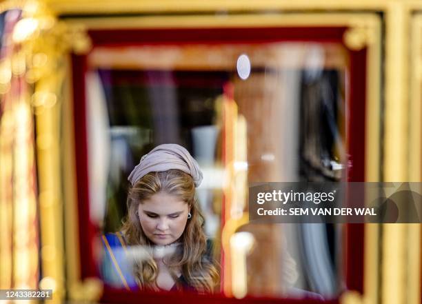 Crown Princess Catharina-Amalia gets in the Glass Carriage as she leaves the Noordeinde Palace to attend the Prince Day ceremony at the Royal...