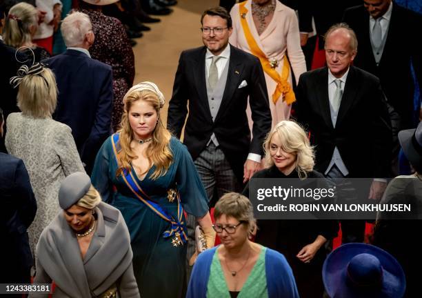Netherlands' Crown Princess Catharina-Amalia and Queen Maxima leave the Royal Theater, known as Koninklijke Schouwburg, during the Prince Day...