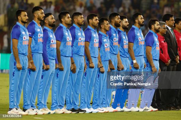 Indian players stand for the National anthem during game one of the T20 International series between India and Australia at Punjab Cricket...