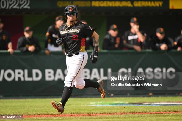 Bruce Maxwell of Team Germany runs home to score during Game 7 between Team Germany and Team Czech Republic at Armin-Wolf-Arena on Tuesday, September...