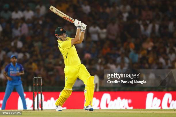 Cameron Green of Australia plays a shot during the T20 International Series between India and Australia at Punjab Cricket Association Stadium on...