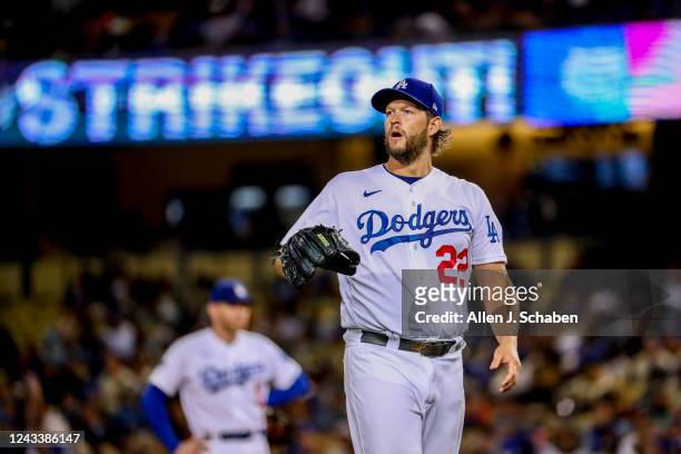 Los Angeles, CA Dodgers starting pitcher Clayton Kershaw walks back to the mound after striking out a batter against the Diamondbacks at Dodger...