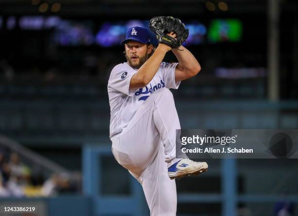 Los Angeles, CA Dodgers starting pitcher Clayton Kershaw winds up as he delivers a pitch against the Diamondbacks at Dodger Stadium in Los Angeles...