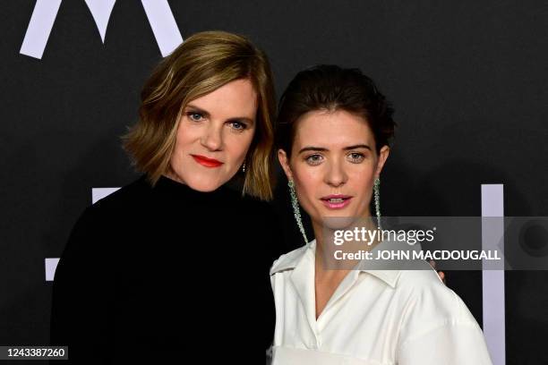 German actresses Fritzi Haberlandt and Liv Lisa Fries pose on the red carpet upon arrival for the premiere of the 'Babylon Berlin' tv series' fourth...