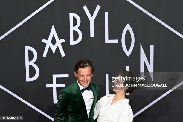 German actor Volker Bruch and German actress Liv Lisa Fries pose on the red carpet upon arrival for the premiere of the 'Babylon Berlin' tv series'...