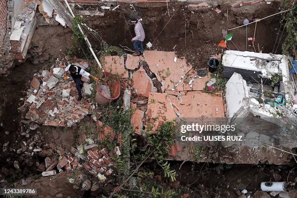 Aerial view of a house that collapsed after yesterday's earthquake in Colima, state of Colima, Mexico, on September 20, 2022. - Two people were...