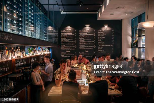 Steady crowd keeps Ardesia, a wine bar near the theater district in Midtown Manhattan, busy late into the night on Friday evening, July 29, 2022 in...