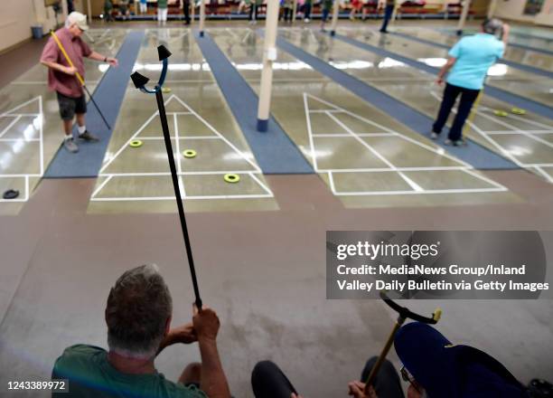 Hemet, CA Shuffleboard competitors look on during the 37th annual Oldlympics competition for seniors at Weston Park in Hemet on Monday, Sept. 19,...