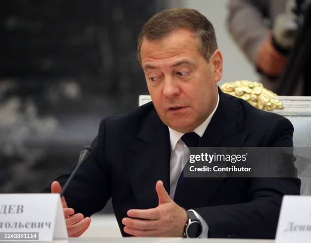 Russian Security Council Deputy Chairman and former President Dmitry Medvedev grimases during a meeting on the military-industrial complex at the...