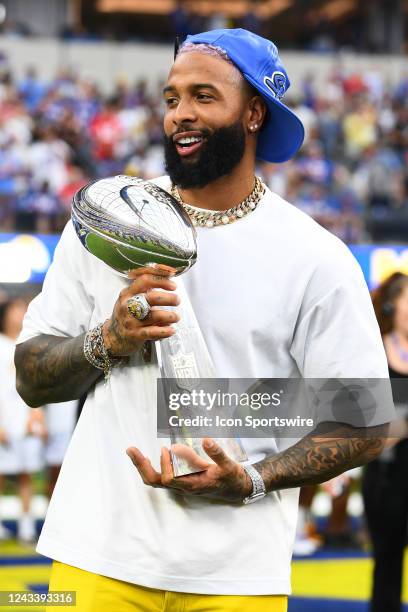 Former Los Angeles Rams wide receiver Odell Beckham Jr. Holds the Super Bowl trophy before the NFL game between the Buffalo Bills and the Los Angeles...