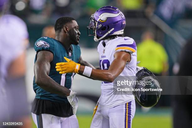 Philadelphia Eagles wide receiver A.J. Brown and Minnesota Vikings wide receiver Justin Jefferson shake hands during the game between the Minnesota...