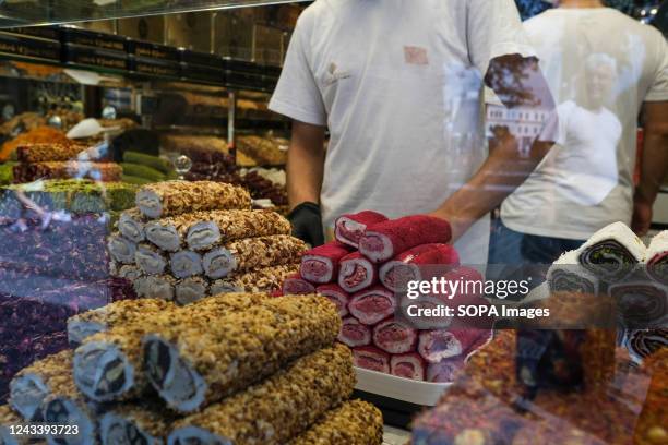 Close-up view of Turkish delight counter. Located in the Eminönü district of Istanbul, the Historical Spice Bazaar continues to be a favorite...