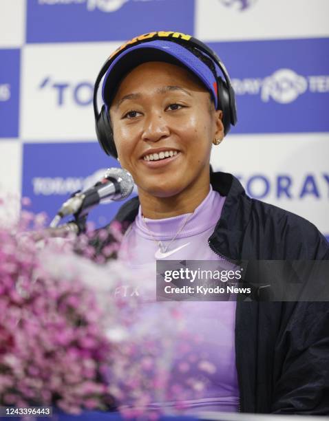 Japan's Naomi Osaka speaks at a press conference after winning a women's singles first-round match against Australia's Daria Saville at the Toray Pan...