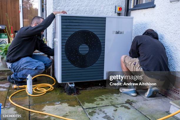 Technicians from Solaris Energy carry out the first annual service and clean on a Vaillant Arotherm plus 7kw air source heat pump that was installed...