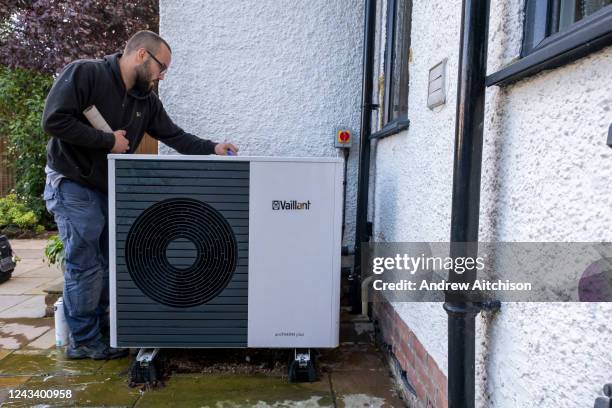 Technicians from Solaris Energy carry out the first annual service and clean on a Vaillant Arotherm plus 7kw air source heat pump that was installed...