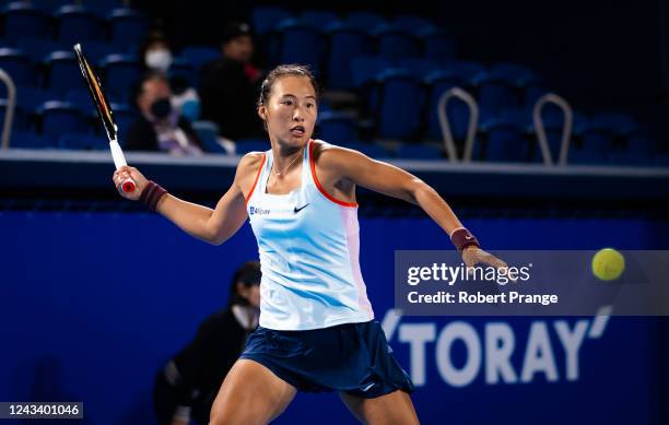 Qinwen Zheng of China in action against Paula Badosa of Spain in her second round match on Day 3 of the Toray Pan Pacific Open at Ariake Coliseum on...