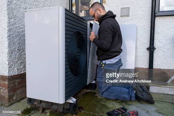 Technicians from Solaris Energy carry out the first annual service and clean on a Vaillant Arotherm plus 7kw air source heat pump that was installed...