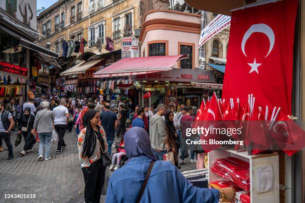 Turkish national flags for sale at a souvenir store in the Mahmutpasha Bazaar in the Fatih district of Istanbul, Turkey, on Tuesday, Sept. 20, 2022....