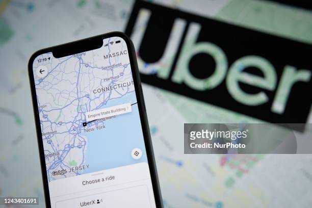 The Uber app application with a map of New York City is seen on an Apple iPhone mobile phone in this photo illustration Warsaw, Poland on 21...