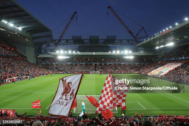 General view as building work continues on the Anfield Road stand whilst fans wave flags and banners in The Kop before the UEFA Champions League...