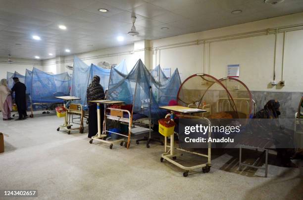 Patients suffering from dengue fever receive medical treatment at an isolation ward of a Lady Reading government hospital in Peshawar, Pakistan, 19...