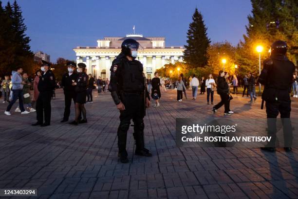 Police officers are seen deployed in central Novosibirsk on September 21 following calls to protest against partial mobilisation announced by...