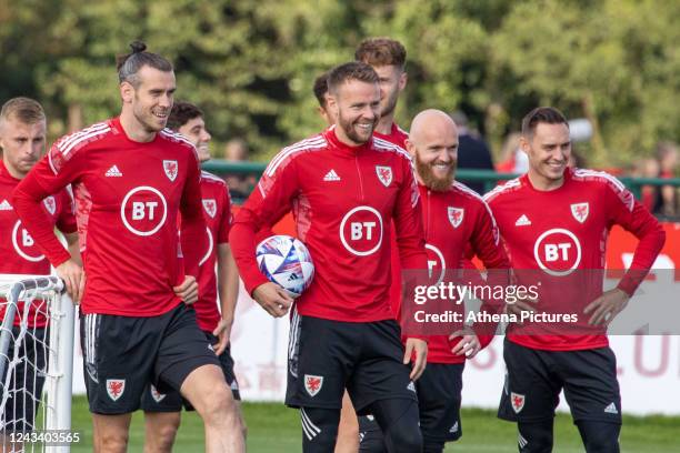 Gareth Bale, Chris Gunter, Jonny Williams and Connor Roberts during the Wales training session at The Vale Resort on September 21, 2022 in Hensol,...