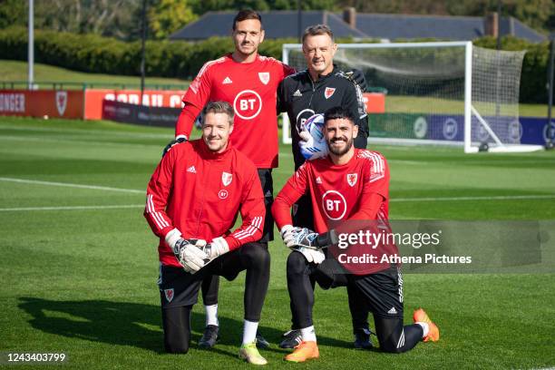 Danny Ward, goalkeeping coach Tony Roberts Wayne Hennessy and Tom King during the Wales training session at The Vale Resort on September 21, 2022 in...