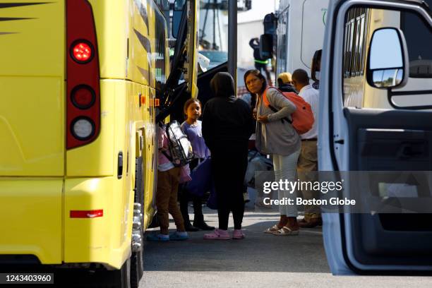 Martha's Vineyard, MA Venezuelan migrants gather at the Vineyard Haven ferry terminal. The group was transported to Joint Base Cape Cod in Buzzards...