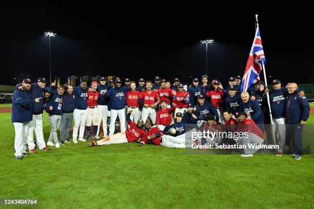 Team Great Britain celebrates after qualifying for the World Baseball Classic by defeating Team Spain at Armin-Wolf-Arena on Tuesday, September 20,...