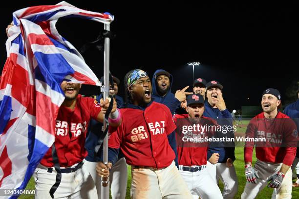 Team Great Britain celebrates after qualifying for the World Baseball Classic by defeating Team Spain at Armin-Wolf-Arena on Tuesday, September 20,...