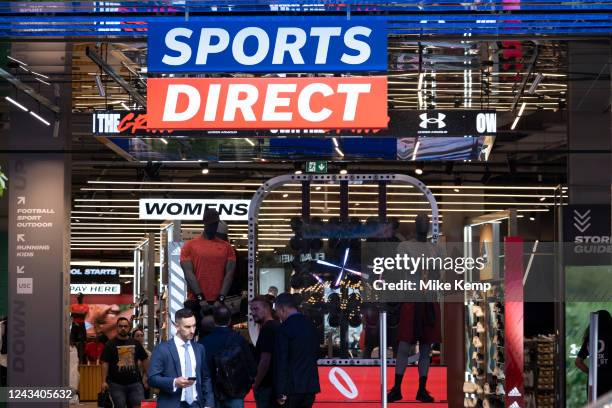 Shoppers and visitors out on Oxford Street pass Sports Direct on 7th September 2022 in London, United Kingdom. Oxford Street is a major retail centre...