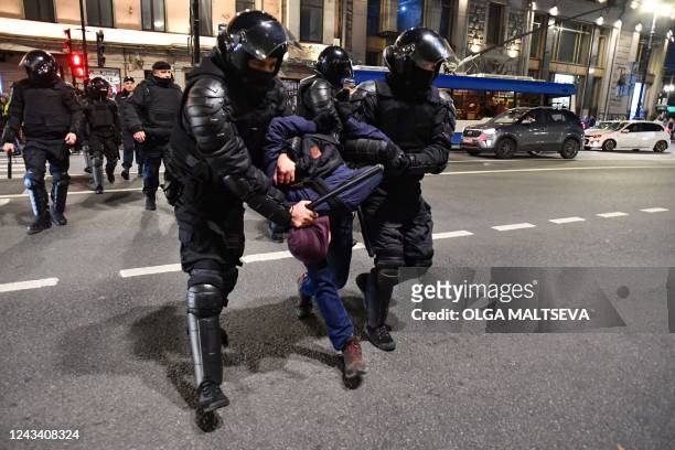 Police officers detain demonstrators in Saint Petersburg on September 21 following calls to protest against partial mobilisation announced by...