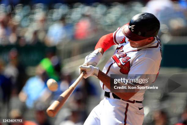 Matt Olson first baseman of the Atlanta Braves makes contact during the MLB game between the Washington Nationals and the Atlanta braves on September...