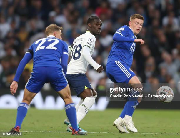 Tottenham Hotspur's Yves Bissouma gets win between Leicester City's Kiernan Dewsbury-Hall and Harvey Barnes during the Premier League match between...